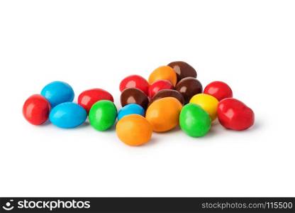 Colorful candies. colorful chocolate buttons on a white background