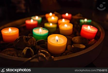 Colorful candle lights in the dark