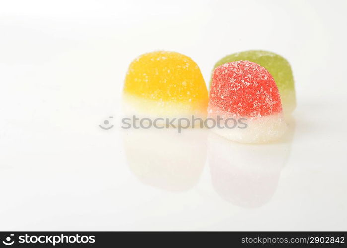 colorful candy jelly in sugar, isolated