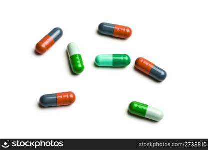 Colorful capsules isolated on white background