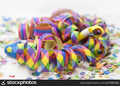 Colorful carnival background with stripes and whistle