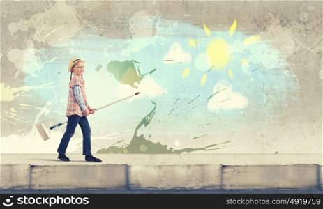 Colorful childhood. Cute girl of school age painting wall with roller