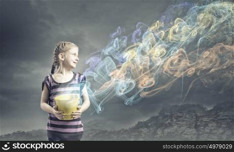 Colorful childhood!. Cute girl with bucket and colorful springs coming out