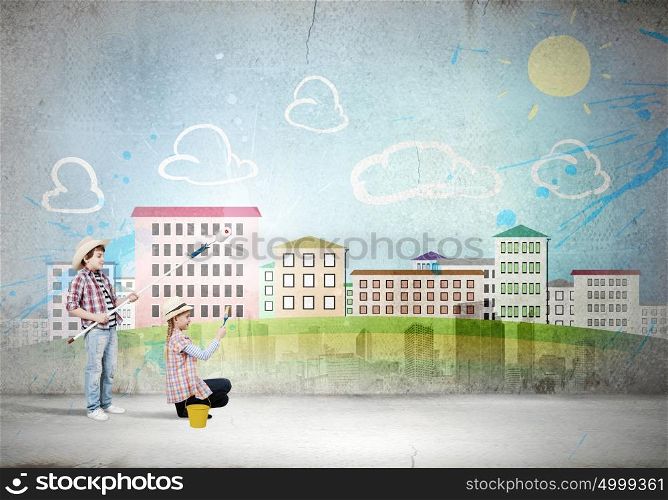 Colorful childhood. Two children of school age painting wall with roller