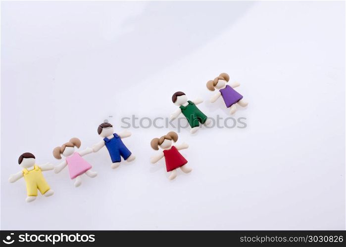 Colorful Children Figures. Colorful dressed children figures on a white background