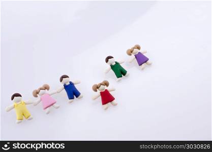 Colorful Children Figures. Colorful dressed children figures on a white background