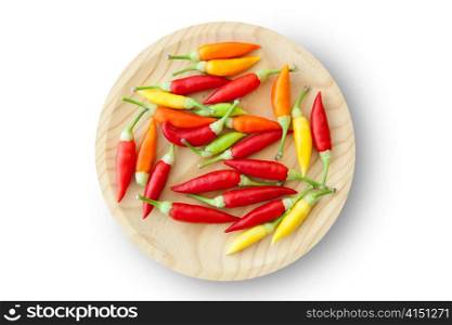 colorful chili peppers plate isolated on white background
