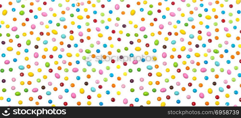 Colorful chocolate candy pills isolated on white background.. Colorful candies isolated