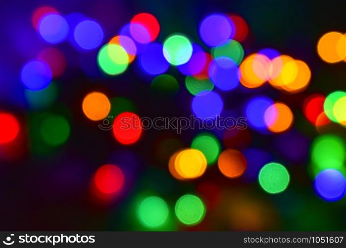 Colorful christmas lights defocused abstract bokeh background