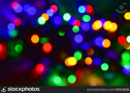 Colorful christmas lights defocused abstract bokeh background