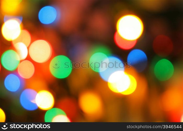 Colorful christmas lights out of focus, may be used as background