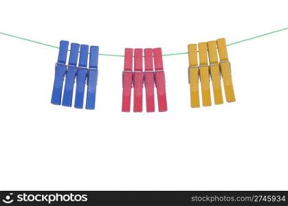 colorful clothespin hanging on a washing line (isolated on white background)