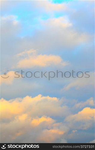 Colorful clouds in the sky at sundown, may be used as background