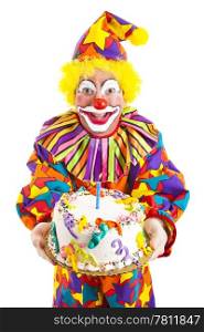 Colorful clown holding a birthday cake. Isolated on white.