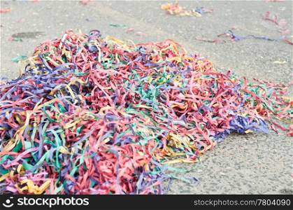 colorful confetti and streamers at the street after Carnival Parade