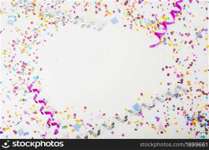 colorful confetti curling streamers white background with space text. Resolution and high quality beautiful photo. colorful confetti curling streamers white background with space text. High quality beautiful photo concept
