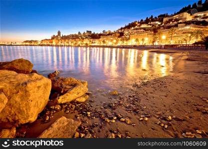 Colorful Cote d Azur town of Menton beach and architecture evening view, Alpes-Maritimes department in southern France
