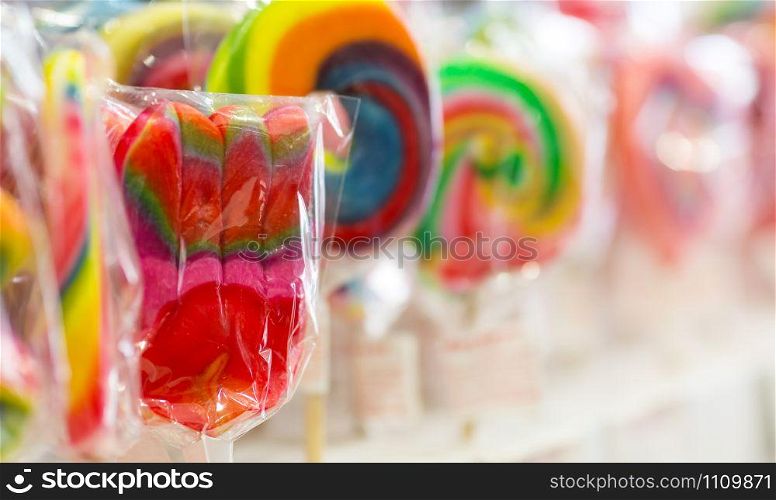 Colorful covered lollipops in a candy shop