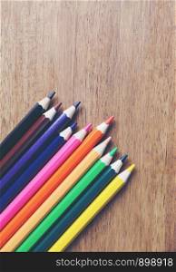 Colorful Crayon, Various colored pencils Paint equipment on wooden table.