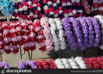 colorful crowns for sale made of fake flowers
