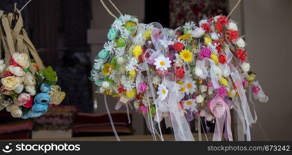 colorful crowns for sale made of fake flowers