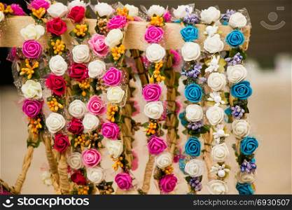 colorful crowns for sale made of fake flowers