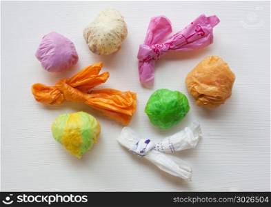 Colorful crumpled plastic bag.. Colorful crumpled plastic bag on white background.