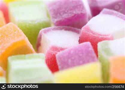 Colorful cube jelly candy isolated in white background