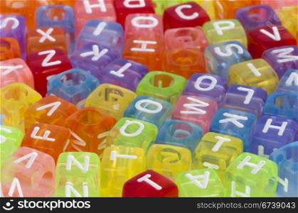 Colorful cubes with letters scattered randomly