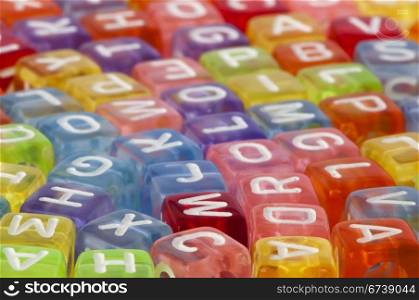 Colorful cubes with letters scattered randomly