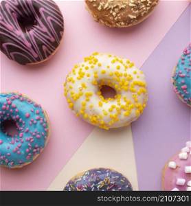 colorful donuts with sprinkles close up