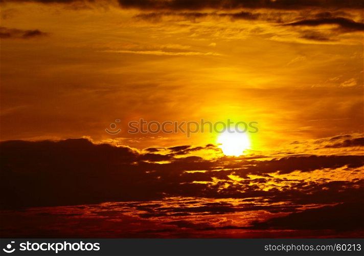 colorful dramatic sky with cloud at sunset. Golden sky background