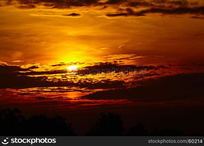 colorful dramatic sky with cloud at sunset. Golden sky background