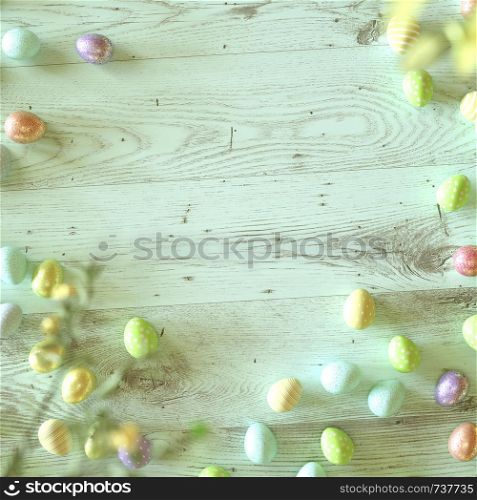 Colorful Easter eggs decorated with stripes, flowers and spots in blue, green and yellow on green wood background with copy space for your holiday greeting in square format