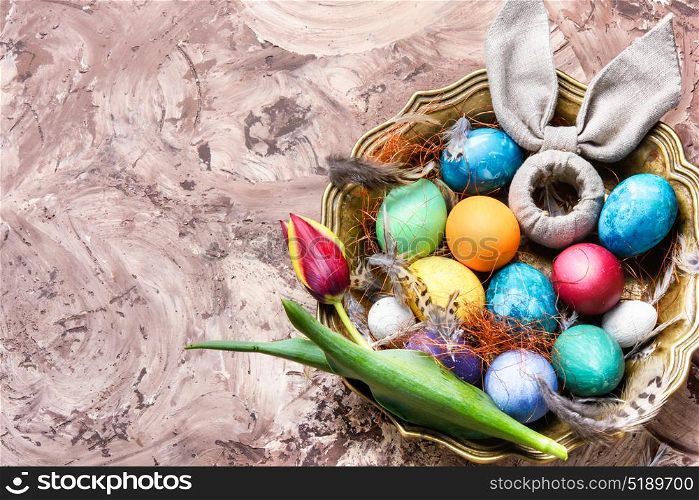 Colorful Easter eggs. Easter colored egg and symbolic rabbit in box