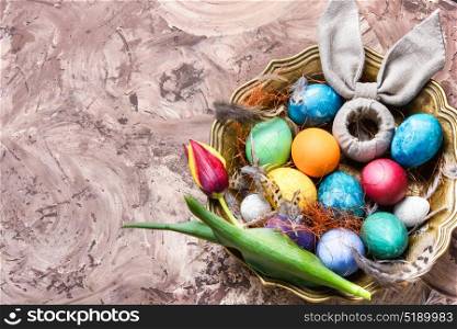 Colorful Easter eggs. Easter colored egg and symbolic rabbit in box