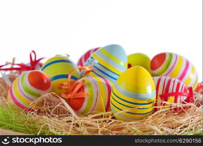 Colorful easter eggs isolated in basket
