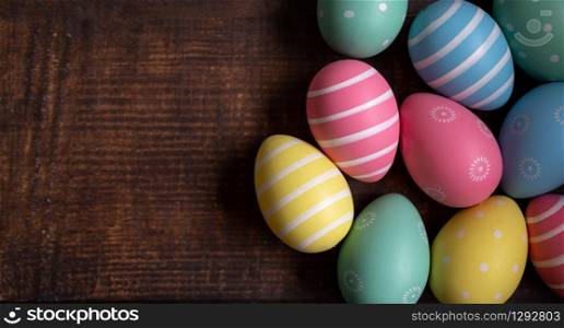 Colorful Easter eggs on old wooden background. Colorful Easter eggs