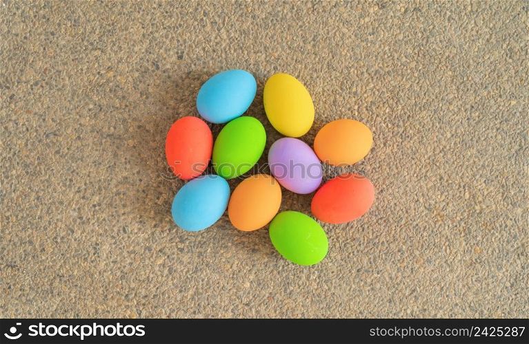 Colorful easter eggs on stone background. Food decoration on holiday.