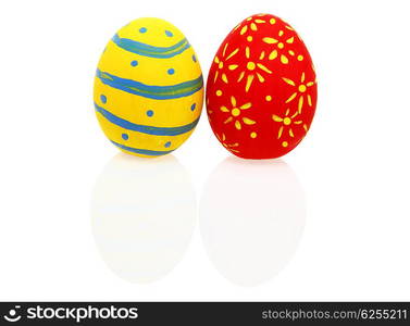 Colorful Easter eggs with reflection over white background