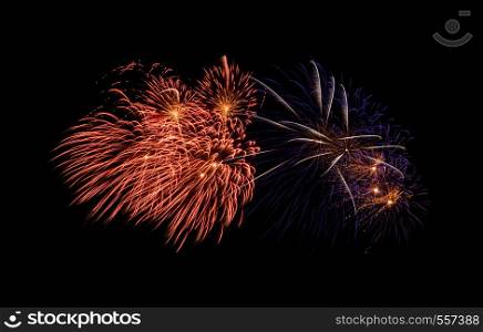 Colorful exploded fireworks display, isolated on black background