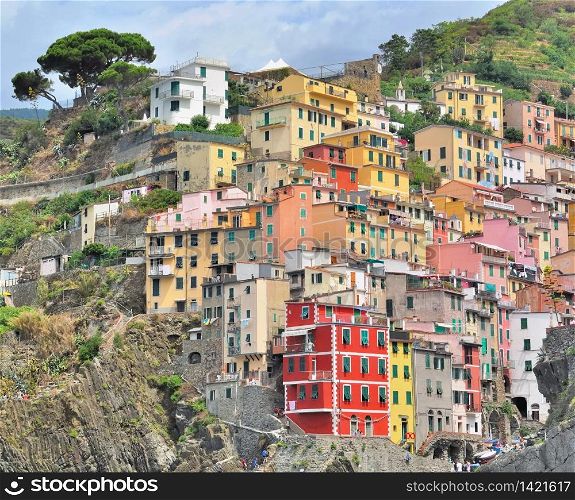 "colorful facade in a village on cliff in Five land" in Italy "
