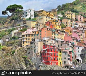 "colorful facade in a village on cliff in Five land" in Italy "