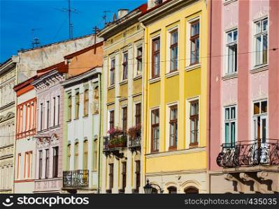 colorful facades of old buildings at the main square of beautiful town