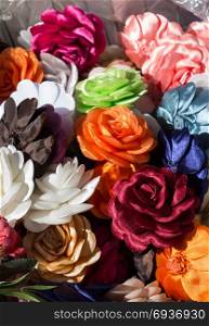 Colorful fake artificial flowers in view