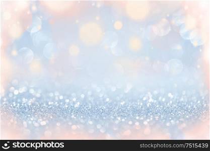 Colorful festive lights over silver glitters abstract background, Christmas New Year party celebration concept. Festive lights background