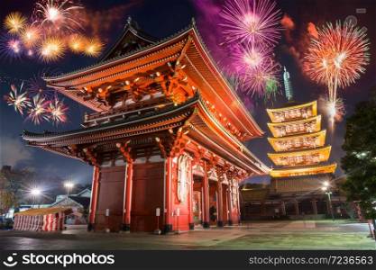 Colorful firework over abstract beautiful temple in japanese style celebrate new year at night time