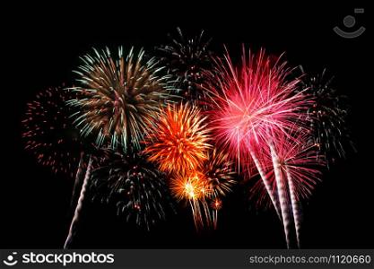 Colorful Fireworks in the Night sky,Mix firecracker on drak sky background.