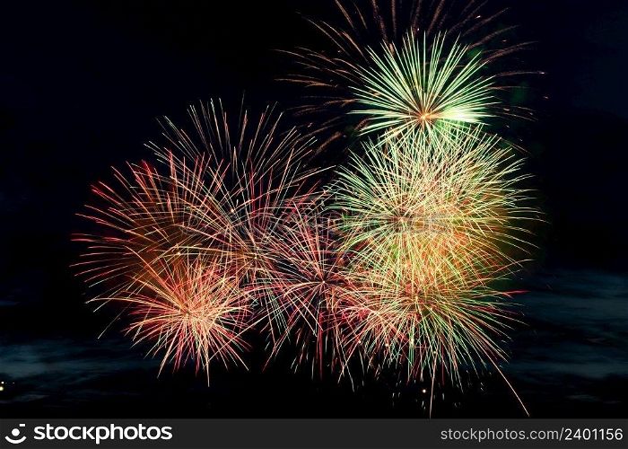 Colorful fireworks on a black background. Celebration and holidays concept. Independence Day 4th of July, New Year, festival. Bright explosions of lights in sky. Place for your text.. Colorful fireworks on black background. Celebration and holidays concept. Independence Day 4th of July, New Year, festival. Bright explosions of lights in sky.