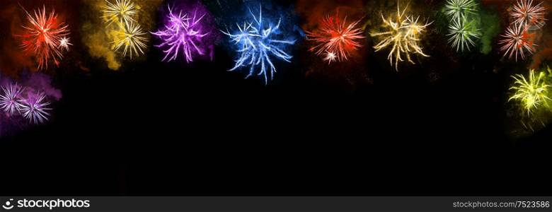Colorful fireworks on black background. Holidays banner. Happy New Year!